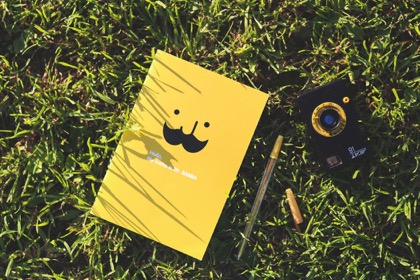 camera-notebook-pen-yellow